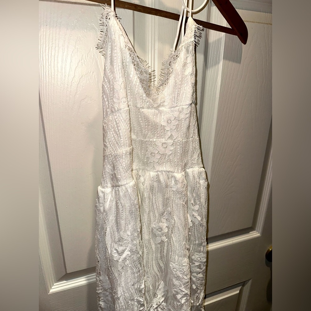 White floral lace mini dress with lace up back and zipper with lace edging